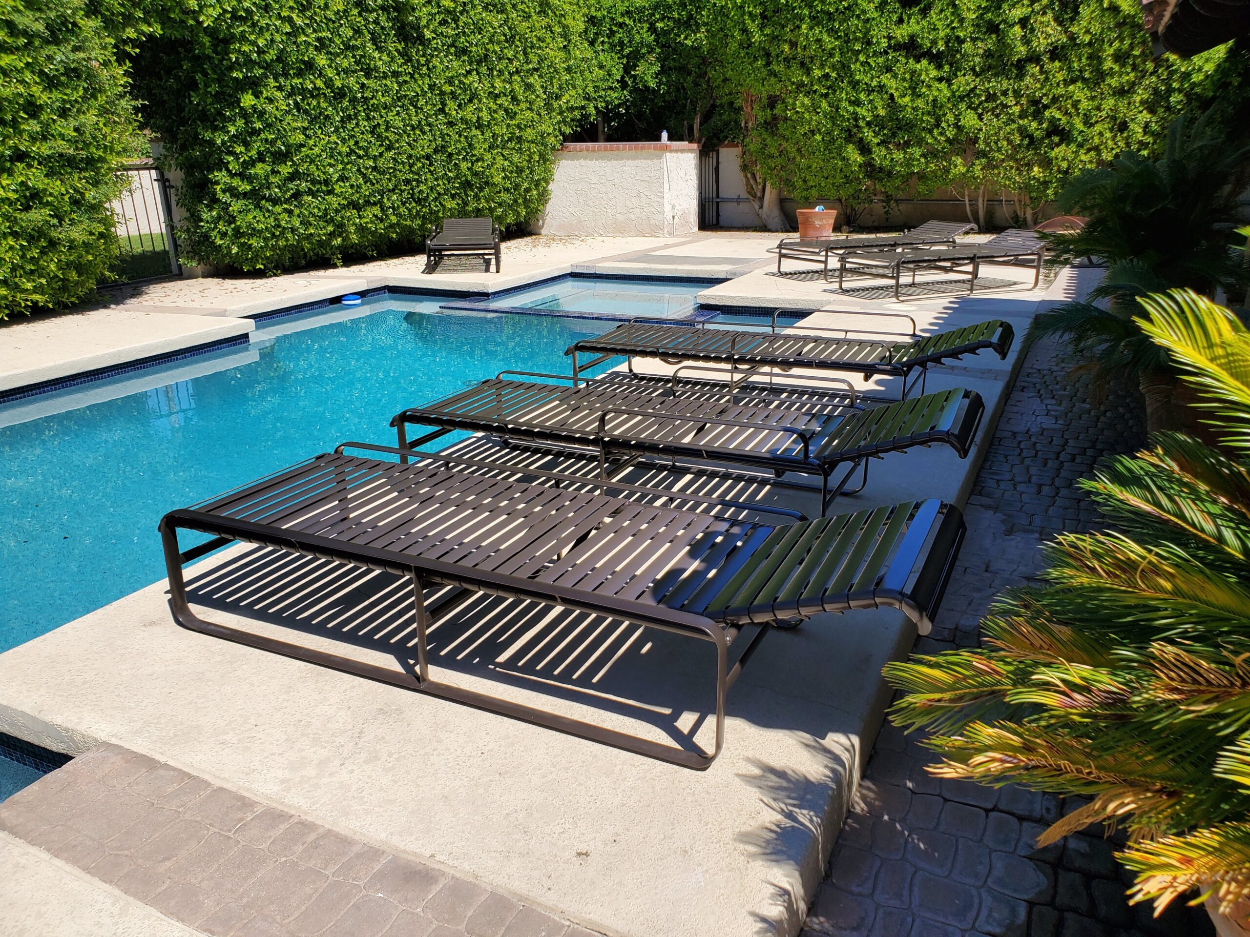 Finished vinyl re-strapped patio furniture