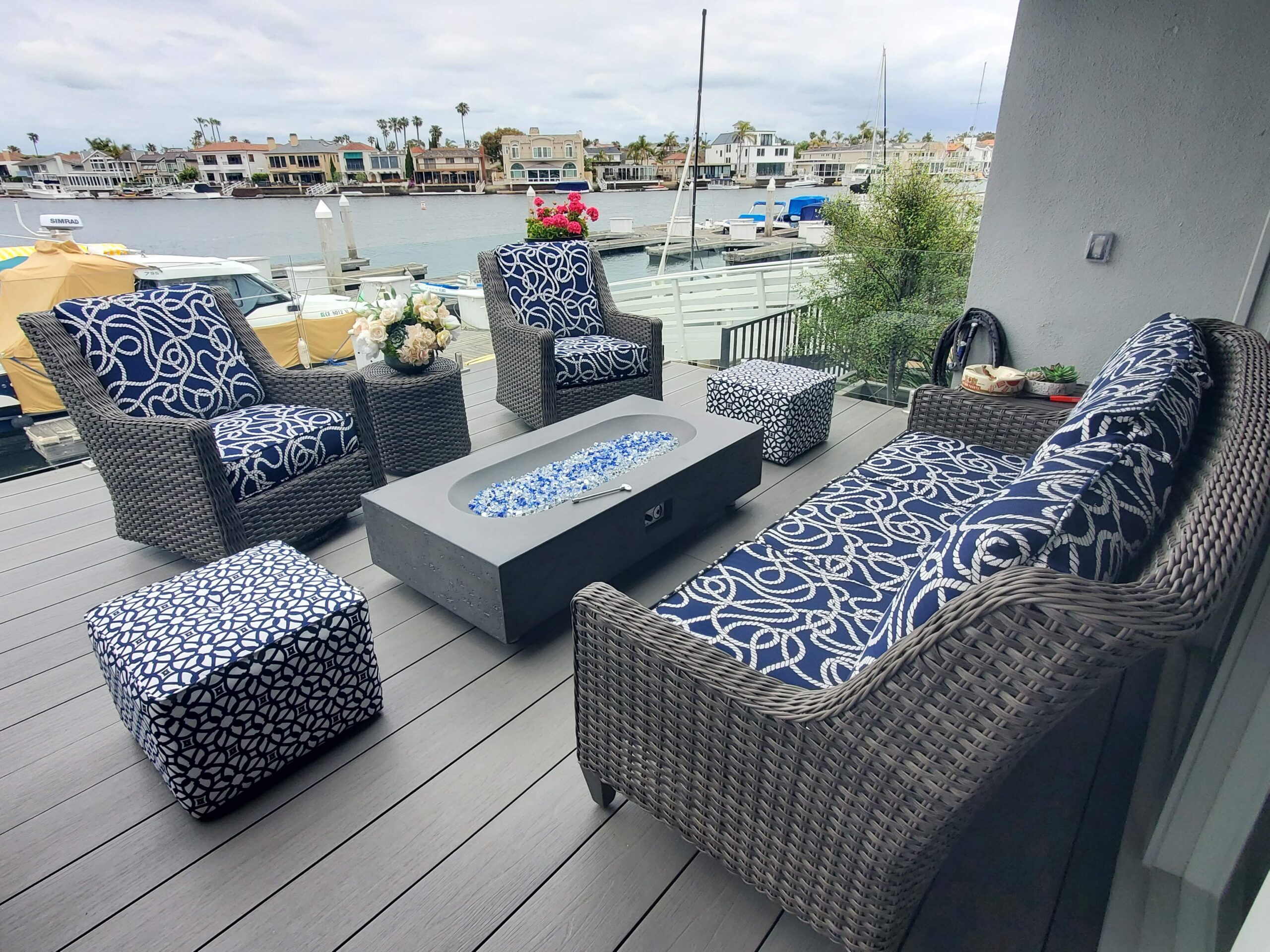 Custom navy rope-pattern cushions on waterfront patio furniture, Huntington Beach